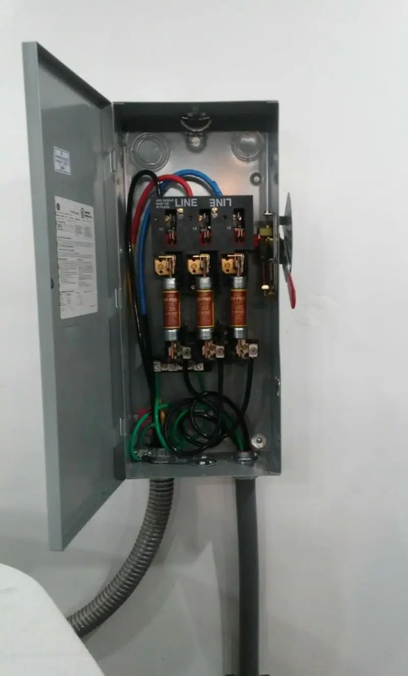 Three-phase disconnect switch installed for Smoke Detector Installation in Stanley